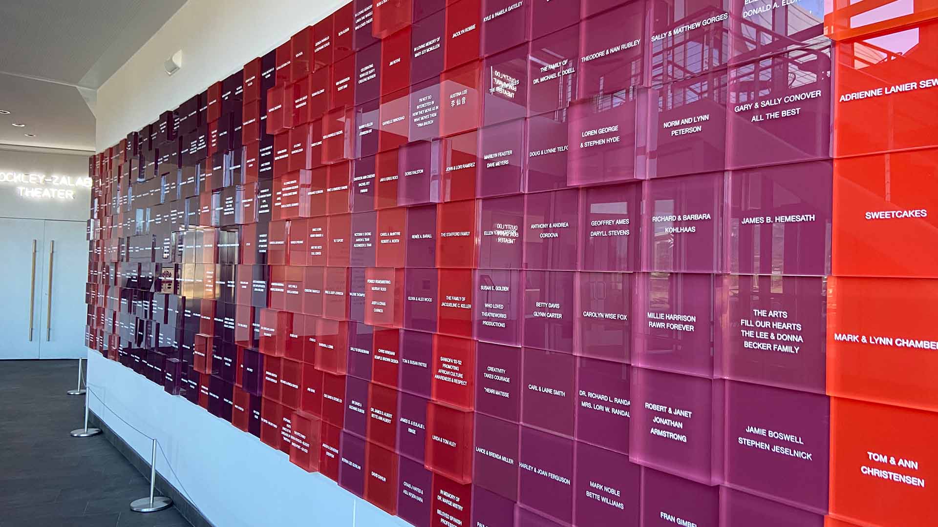 colorful art project with donor names on cubes