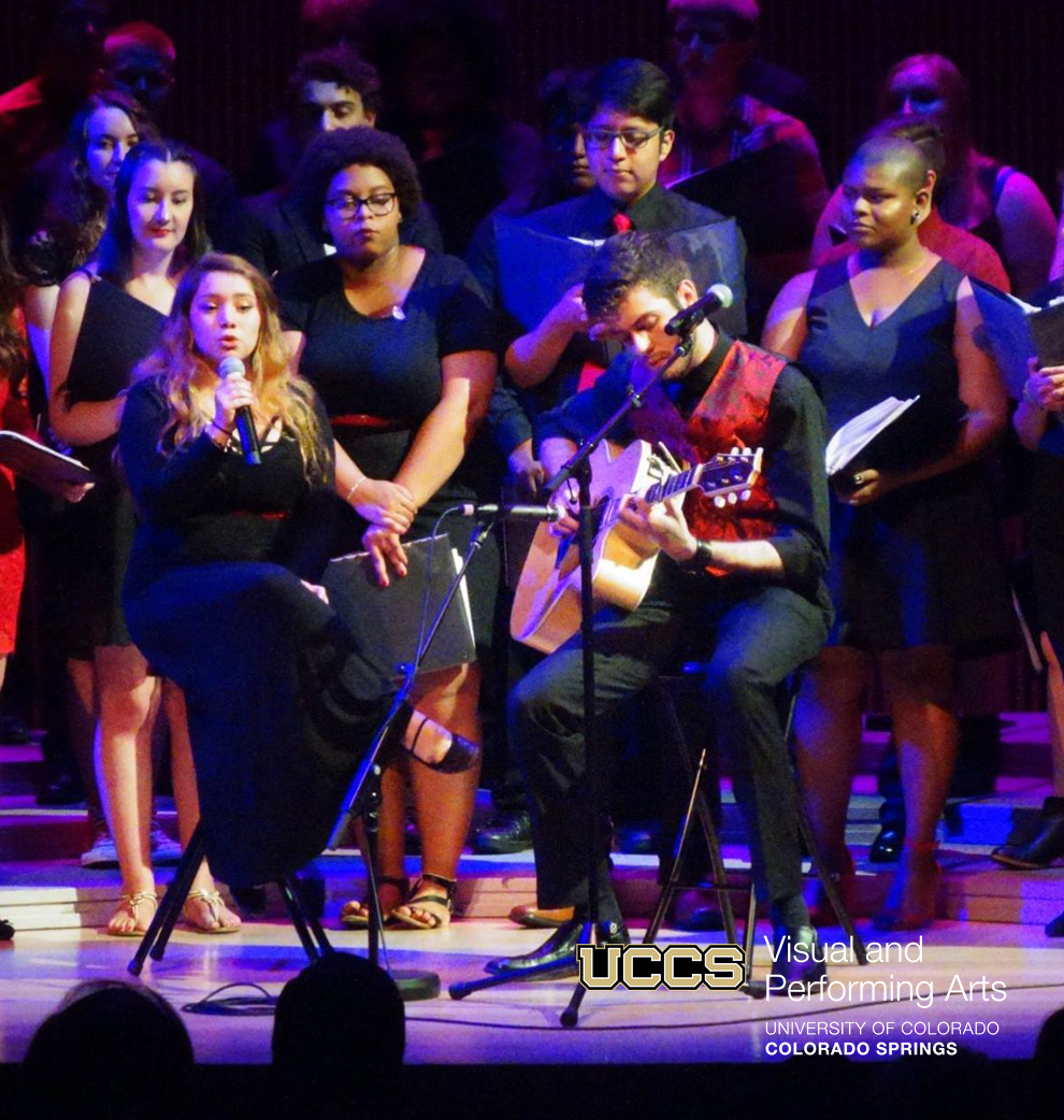 photo of students singing onstage