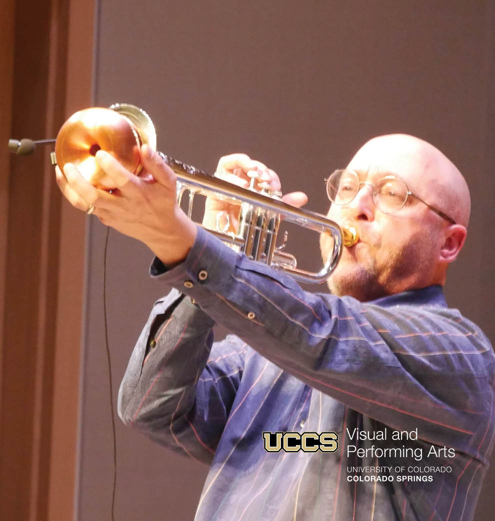 picture of glen whitehead performing on trumpet